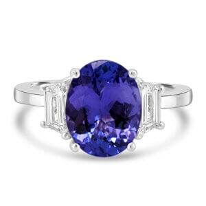 Pre-Owned Oval Tanzanite ring with Trapezoid cut Diamond sides made in Platinum